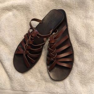 Never worn slip on sandals